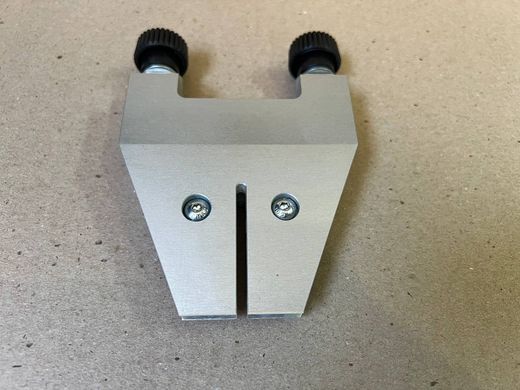 Central clamp for the KosiM sharpening system