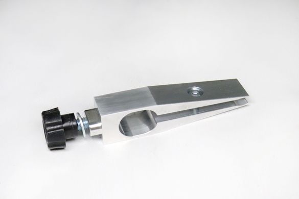 Solid milled undercut clamp for knives with back slopes